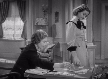 Movie still from “Make Way for Tomorrow” (1937), directed by Leo McCarey – Two women sitting at a table in front of a window; Medium shot, Over the shoulder angle
