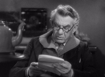 Movie still from “Make Way for Tomorrow” (1937), directed by Leo McCarey – An older man reading a book in a room; Close Up shot, Over the shoulder angle