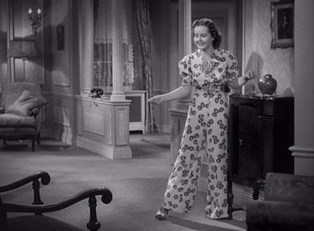 Movie still from “Make Way for Tomorrow” (1937), directed by Leo McCarey – An old photo of a woman in a room; Medium shot, High angle