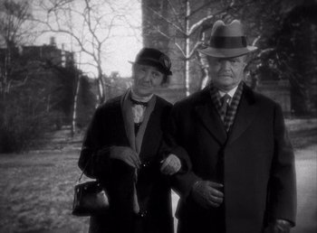 Movie still from “Make Way for Tomorrow” (1937), directed by Leo McCarey – An older man and a woman standing next to each other; Medium shot, High angle