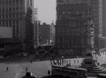 Movie still from “Make Way for Tomorrow” (1937), directed by Leo McCarey – A black and white photo of a busy city street; Extreme Wide shot, High angle