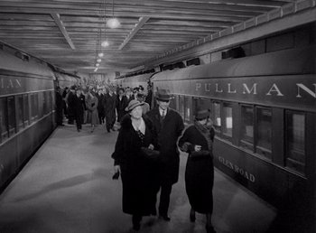 Movie still from “Make Way for Tomorrow” (1937), directed by Leo McCarey – A black and white photo of people walking in a train station; Extreme Wide shot, High angle