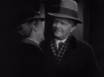 Movie still from “Make Way for Tomorrow” (1937), directed by Leo McCarey – An older man and a younger woman wearing hats; Close Up shot, Over the shoulder angle