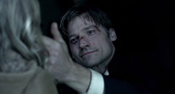 Movie still from “Mama” (2013), directed by Andy Muschietti – A person holding a cell phone; Close Up shot, Over the shoulder angle