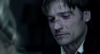 Movie still from “Mama” (2013), directed by Andy Muschietti – A person wearing a shirt and tie; Close Up shot, Over the shoulder angle