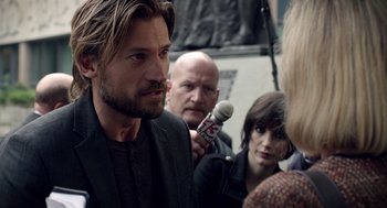 Movie still from “Mama” (2013), directed by Andy Muschietti – A group of men and women are talking to reporters; Close Up shot, Over the shoulder angle