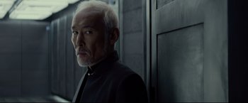Movie still from “Man of Tai Chi” (2013), directed by Keanu Reeves – An older man with white hair looking at the camera; Close Up shot, Low angle