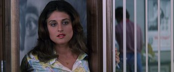 Movie still from “Man on the Moon” (1999), directed by Milos Forman – A person leaning against a wall; Close Up shot, Over the shoulder angle