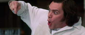 Movie still from “Man on the Moon” (1999), directed by Milos Forman – A person with his mouth wide open; Close Up shot, Low angle