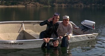 Movie still from “Man's Favorite Sport?” (1964), directed by Howard Hawks – A group of people in a boat in the water; Medium shot, High angle