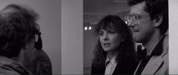 Movie still from “Manhattan” (1979), directed by Woody Allen – Black and white photograph of a woman looking at the camera; Close Up shot, Over the shoulder angle