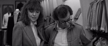 Movie still from “Manhattan” (1979), directed by Woody Allen – A man and a woman on a train; Medium shot, Over the shoulder angle