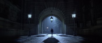 Movie still from “Manhunter” (1986), directed by Michael Mann – A person is standing in the middle of a street; Extreme Wide shot, Low angle