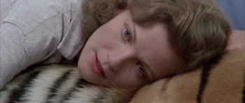 Movie still from “Manhunter” (1986), directed by Michael Mann – A person laying on the ground; Close Up shot, Overhead angle