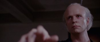 Movie still from “Manhunter” (1986), directed by Michael Mann – An older man is looking into the distance; Close Up shot, Low angle