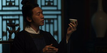 Movie still from “Marco Polo” (2014), created by John Fusco – A man holding a cup in his hands; Close Up shot, Low angle