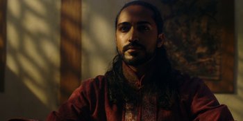 Movie still from “Marco Polo” (2014), created by John Fusco – A person with long black hair; Close Up shot, Over the shoulder angle