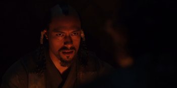 Movie still from “Marco Polo” (2014), created by John Fusco – A person with a beard; Close Up shot, Over the shoulder angle