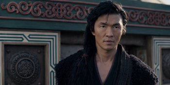 Movie still from “Marco Polo” (2014), created by John Fusco – A man with long black hair wearing a black robe; Close Up shot, Low angle