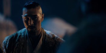 Movie still from “Marco Polo” (2014), created by John Fusco – A person wearing a robe; Close Up shot, Over the shoulder angle