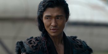 Movie still from “Marco Polo” (2014), created by John Fusco – A person with long black hair; Close Up shot, Over the shoulder angle