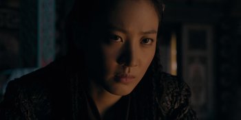 Movie still from “Marco Polo” (2014), created by John Fusco – A person wearing a black shirt; Close Up shot, High angle