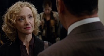 Movie still from “Margaret” (2011), directed by Kenneth Lonergan – A woman standing in front of a man in front of a mirror; Close Up shot, Over the shoulder angle