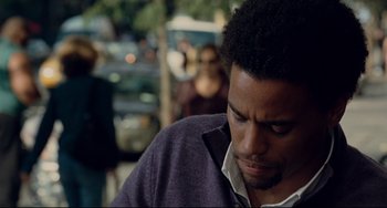 Movie still from “Margaret” (2011), directed by Kenneth Lonergan – A person wearing a purple sweater; Close Up shot, Over the shoulder angle