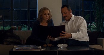Movie still from “Margaret” (2011), directed by Kenneth Lonergan – A man and a woman looking at a laptop; Medium shot, Low angle
