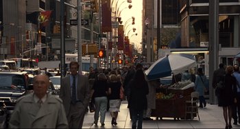 Movie still from “Margaret” (2011), directed by Kenneth Lonergan – A group of people walking down a sidewalk; Wide shot, Over the shoulder angle