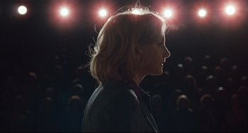 Movie still from “Margaret” (2011), directed by Kenneth Lonergan – A woman standing in front of a crowd of people; Medium shot, Low angle