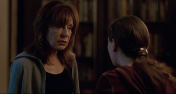 Movie still from “Margaret” (2011), directed by Kenneth Lonergan – A woman standing next to a boy in a room; Close Up shot, Over the shoulder angle