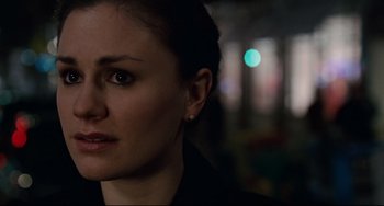 Movie still from “Margaret” (2011), directed by Kenneth Lonergan – A woman's face in the dark; Close Up shot, Over the shoulder angle
