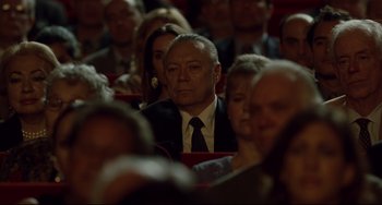 Movie still from “Margaret” (2011), directed by Kenneth Lonergan – A group of people sitting in a room; Medium shot, High angle