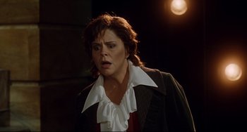 Movie still from “Margaret” (2011), directed by Kenneth Lonergan – A woman in a white shirt and a brown jacket; Close Up shot, Over the shoulder angle