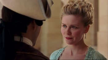 Movie still from “Marie Antoinette” (2006), directed by Sofia Coppola – A man and a woman are looking at one another; Close Up shot, Over the shoulder angle
