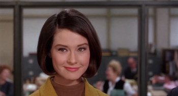 Movie still from “Marnie” (1964), directed by Alfred Hitchcock – A person with short hair; Close Up shot, Over the shoulder angle