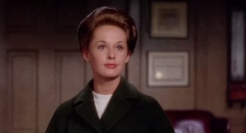 Movie still from “Marnie” (1964), directed by Alfred Hitchcock – A person wearing a coat; Close Up shot, Over the shoulder angle