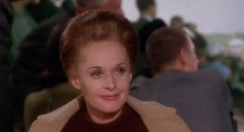 Movie still from “Marnie” (1964), directed by Alfred Hitchcock – A person wearing a brown jacket; Close Up shot, Over the shoulder angle