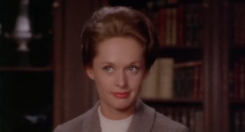 Movie still from “Marnie” (1964), directed by Alfred Hitchcock – A person wearing a suit and tie; Close Up shot, High angle