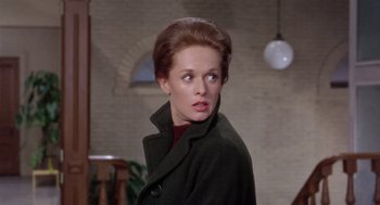 Movie still from “Marnie” (1964), directed by Alfred Hitchcock – A person wearing a coat; Close Up shot, Over the shoulder angle