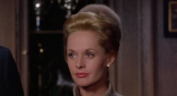 Movie still from “Marnie” (1964), directed by Alfred Hitchcock – An older woman with blonde hair; Close Up shot, High angle