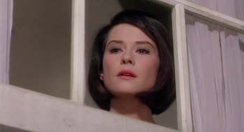 Movie still from “Marnie” (1964), directed by Alfred Hitchcock – A person looking out of a window; Close Up shot, High angle