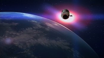 Movie still from “Marooned” (1969), directed by John Sturges – An image of a space ship in the sky above the earth; Extreme Wide shot, Overhead angle