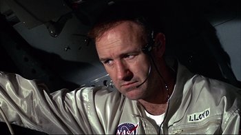 Movie still from “Marooned” (1969), directed by John Sturges – A person wearing a headset; Close Up shot, Low angle