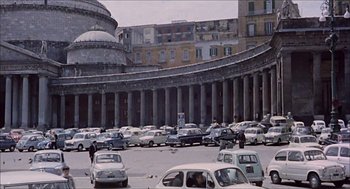 Movie still from “Marriage Italian Style” (1964), directed by Vittorio De Sica – A bunch of cars parked on the side of the street; Extreme Wide shot, High angle