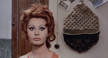 Movie still from “Marriage Italian Style” (1964), directed by Vittorio De Sica – A person wearing a dress; Close Up shot, Low angle