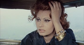 Movie still from “Marriage Italian Style” (1964), directed by Vittorio De Sica – A person with a hand on her head; Close Up shot, High angle
