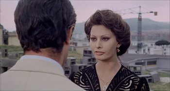 Movie still from “Marriage Italian Style” (1964), directed by Vittorio De Sica – A man and a woman are looking at one another; Close Up shot, Over the shoulder angle