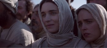Movie still from “Mary Magdalene” (2018), directed by Garth Davis – A person wearing a headscarf; Close Up shot, Low angle